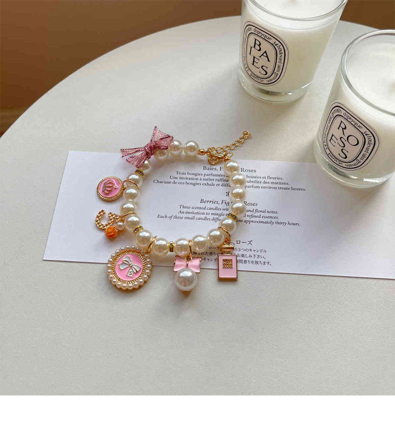 Pink 4-PCS Pearl Charm Pet Necklace - Adjustable Bowknot Collar for Small Dogs & Cats (L: 30+5CM) - view 3