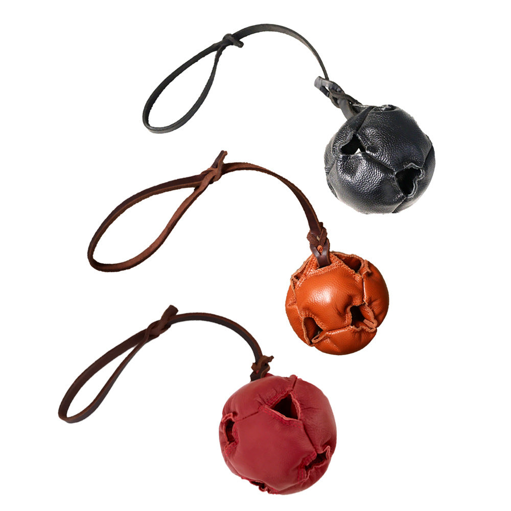 Red Durable Leather Dog Training Ball with Loop Handle - Interactive Bite & Tug Toy for Playful Pups - view 2